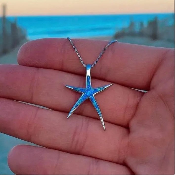 Collar de estrella de mar azul y plateado