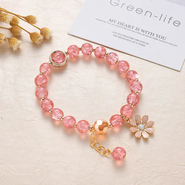 Pulsera de piedra rosa y margaritas