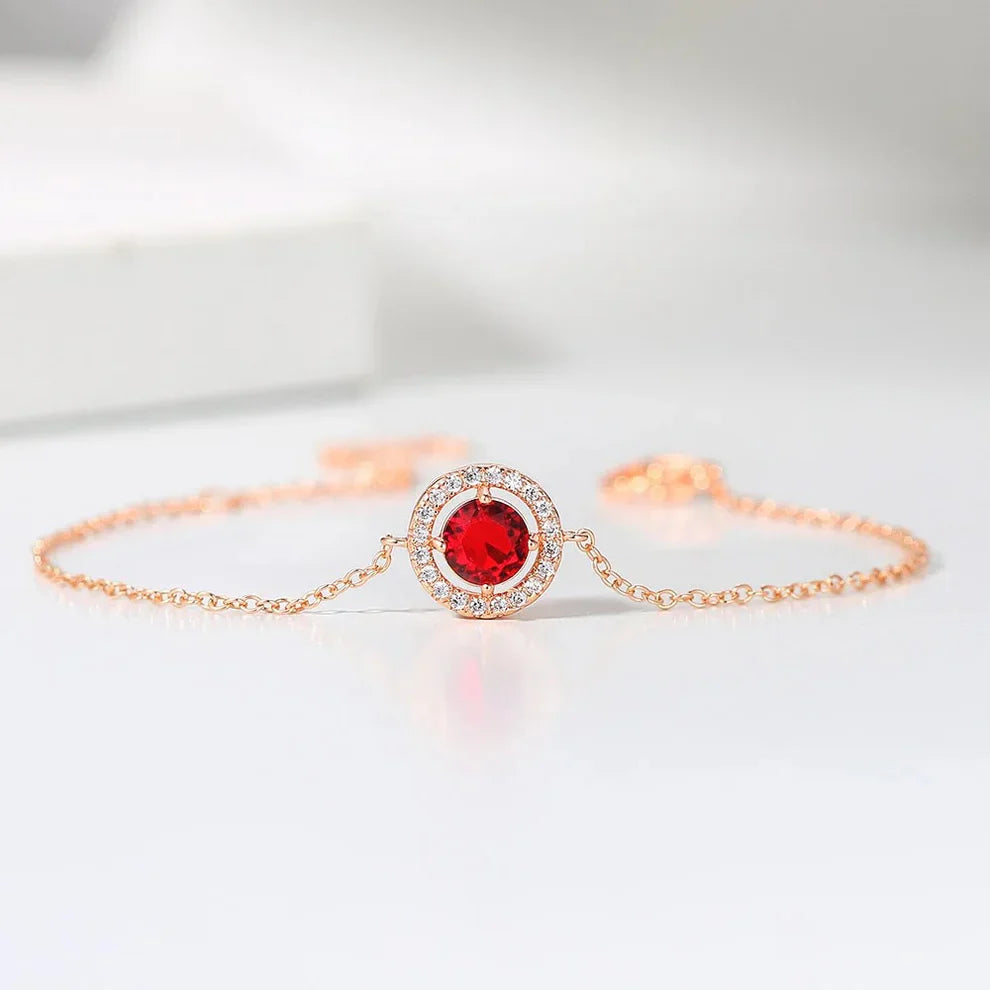 Pulsera clásica rosa con piedras rojas y cristales
