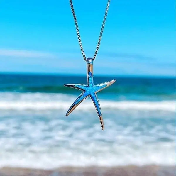 Collar de estrella de mar azul y plateado