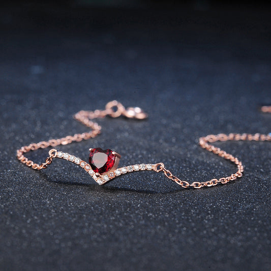 Elegante pulsera de corazón rojo
